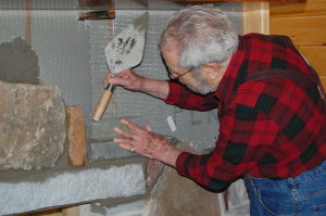 Dad working on Museum fireplace